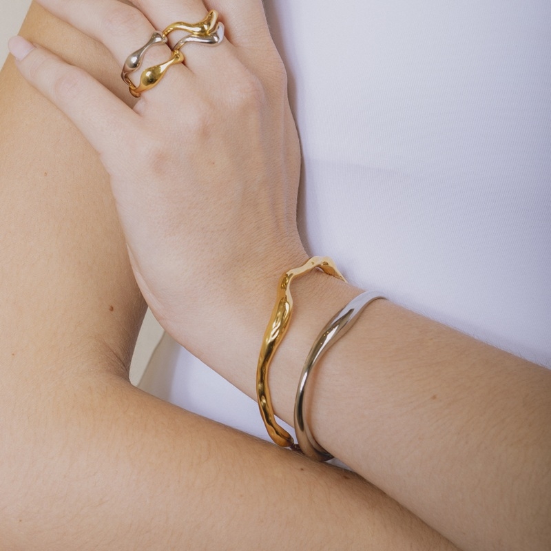 GEISHI gold rigid stainless steel bracelet with irregular design